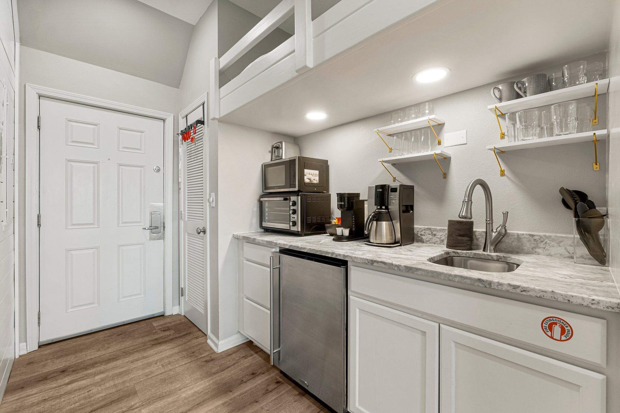 Fridge, microwave, coffee/tea maker, toaster