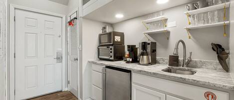 Fridge, microwave, coffee/tea maker, toaster