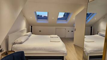 3 habitaciones, caja de seguridad en la habitación y escritorio