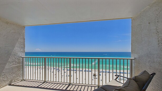 A balcony with a view of a beach and ocean. - Summit Treasure 1312–1 Bedroom–Sleeps 5 (Panama City Beach)