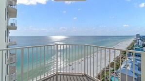 A balcony with a view of the beach and ocean. - Sea Esta 1900–Gulf Views 2BR–Sleeps 6 (Panama City Beach)