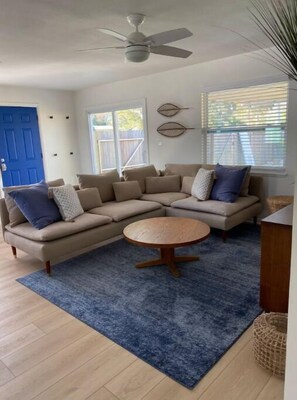 Living area - Gulfport Breezy Cottage - Outdoor living too! (Gulfport)
