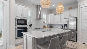 Microwave, stovetop, dishwasher, coffee/tea maker