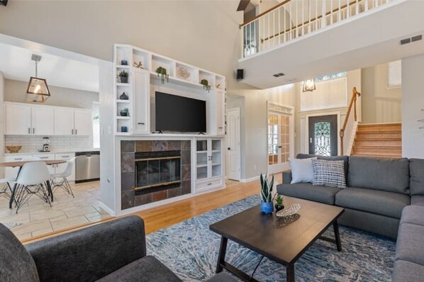 Smart TV, fireplace, foosball