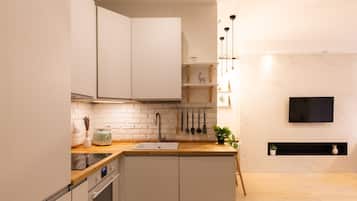 Comfort Apartment | Private kitchen | Full-size fridge, oven, stovetop, dishwasher