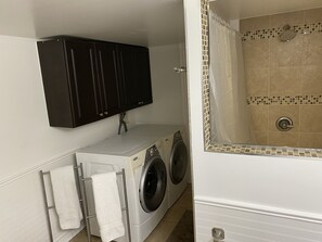 Hair dryer, towels, soap, shampoo