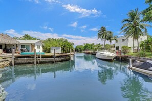 Overlooking a tranquil canal, this waterfront retreat offers a serene escape.
