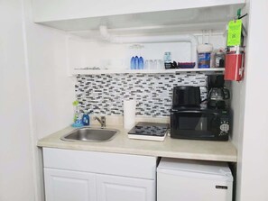 Microwave, stovetop, coffee/tea maker, toaster