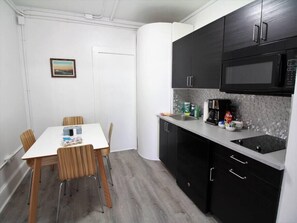 Microwave, stovetop, coffee/tea maker, electric kettle