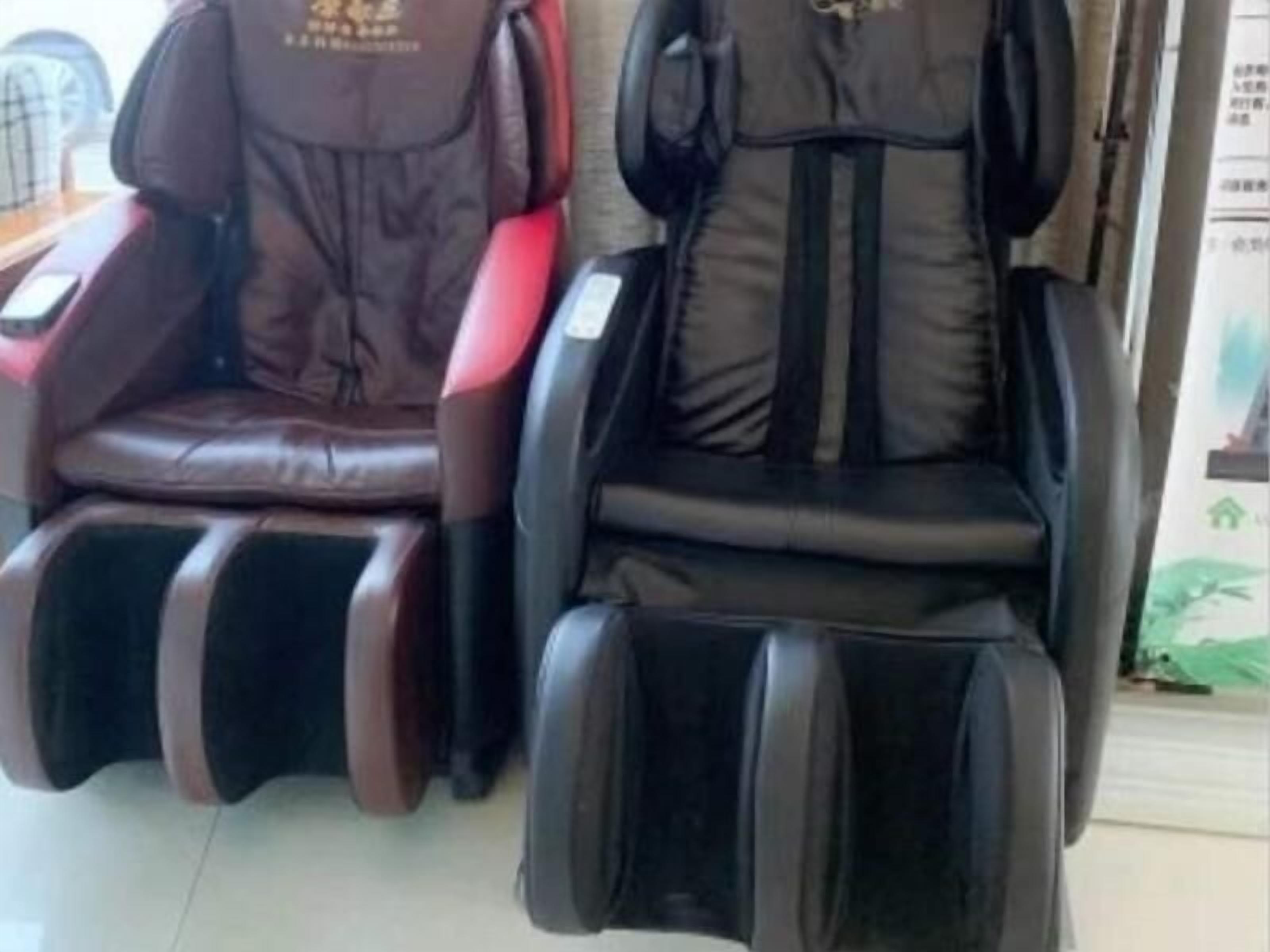 Two massage chairs in a room.