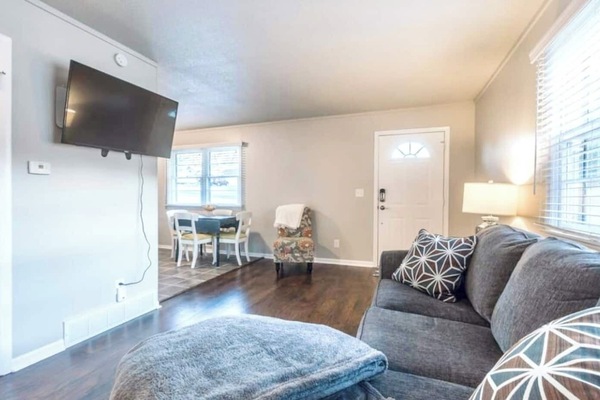 Experience the ultimate in-home entertainment with our luxurious gray sofa and the immersive 55-inch TV. ️✨