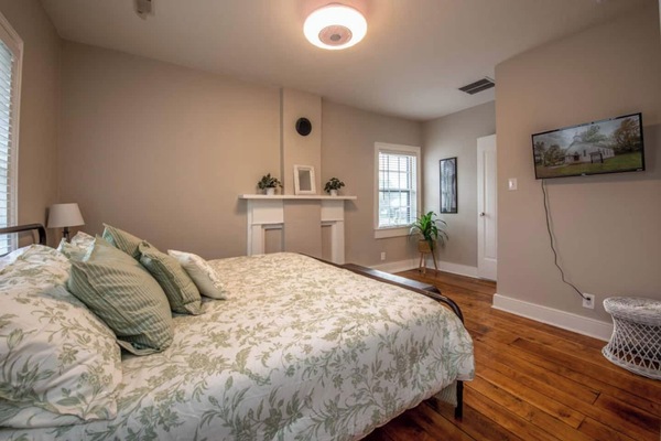 Relax on our comfy king bed while enjoying your favorite shows on the big screen TV.