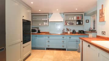 Fridge, electric kettle, toaster, cookware/dishes/utensils