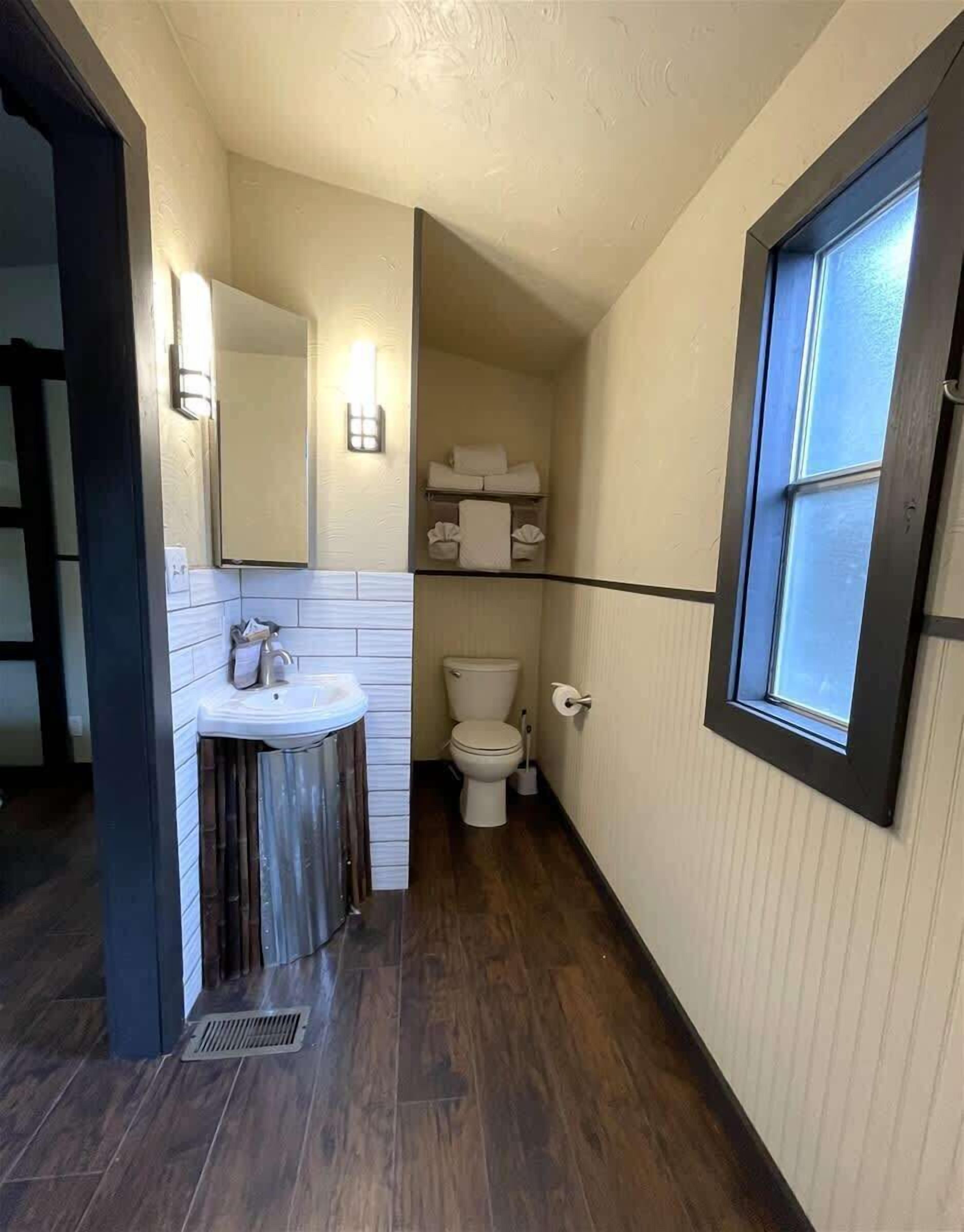 Bathtub, hair dryer, towels