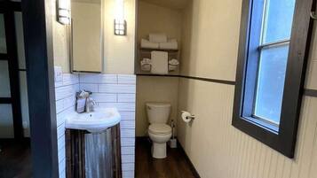 Bathtub, hair dryer, towels