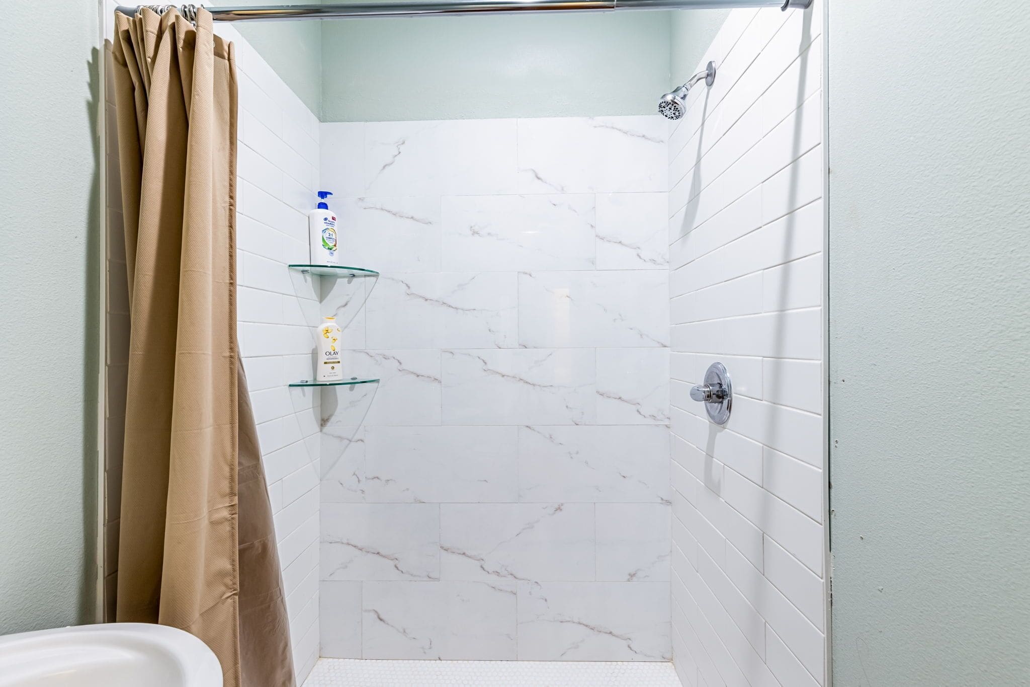 Shower, towels, soap, shampoo
