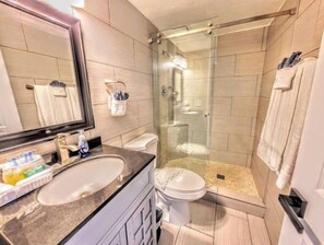 Hair dryer, towels, soap, shampoo