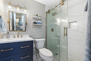Hair dryer, towels, soap, shampoo