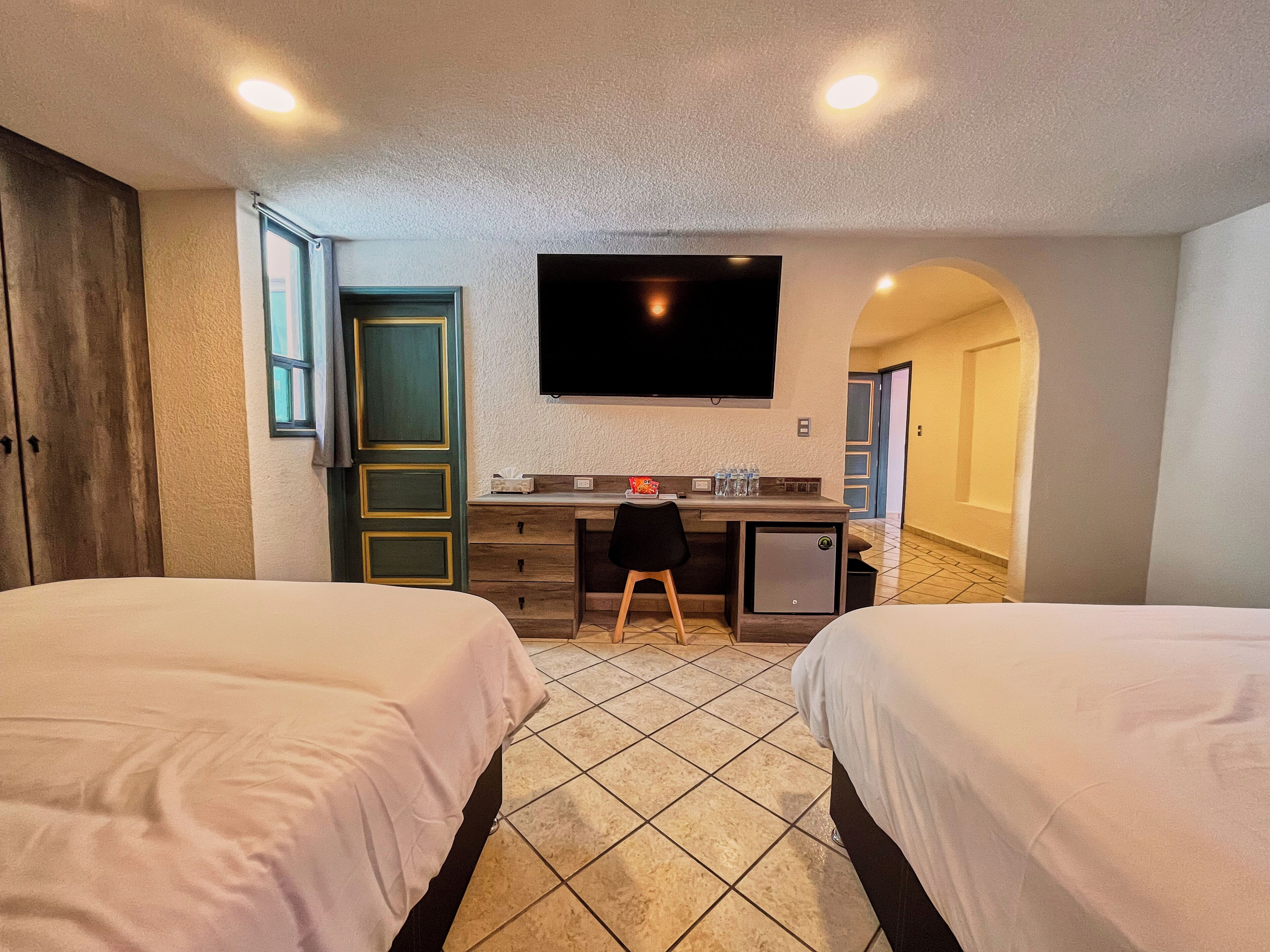 Premium bedding, down duvets, minibar, desk