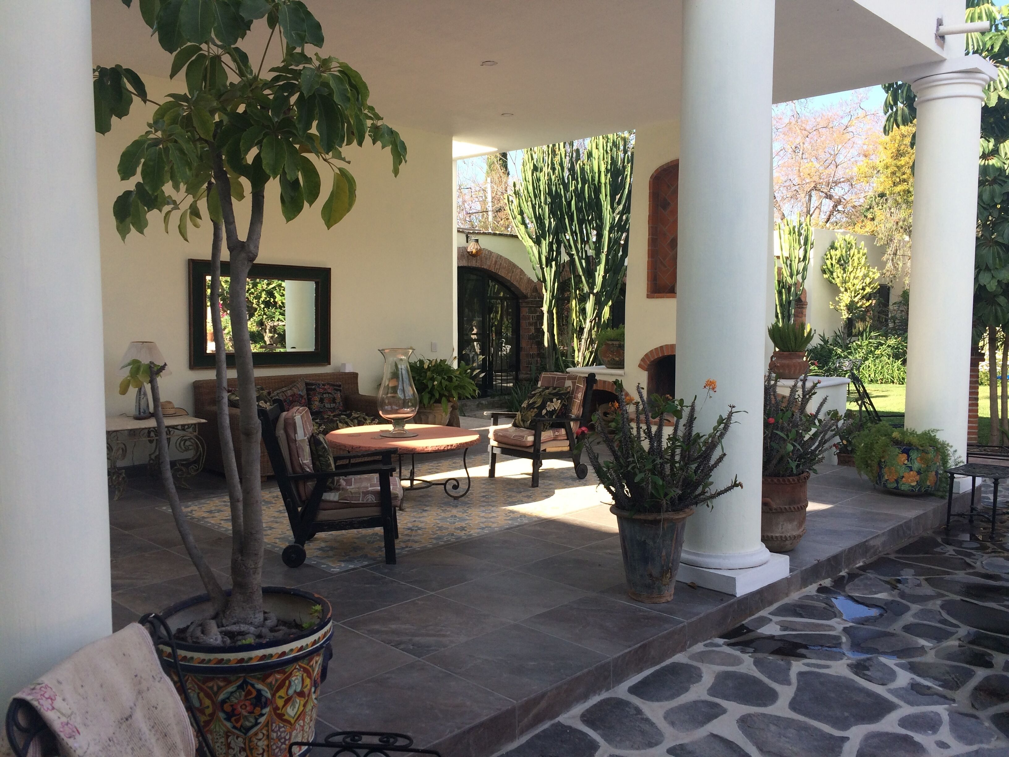 Covered Terrace sitting area and outdoor fireplace