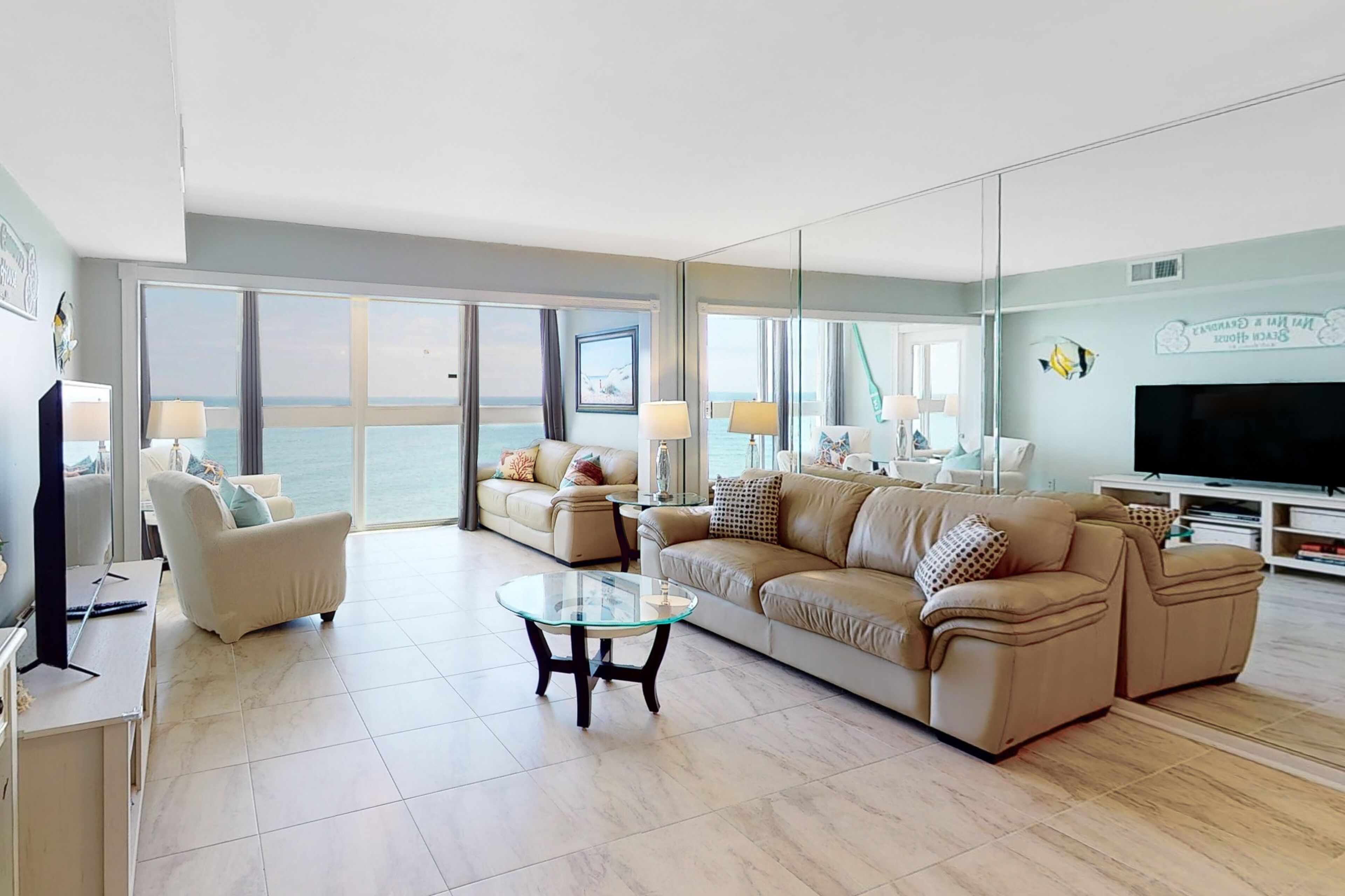 Beachfront condo with Gulf views, pool, washer/dryer, & central AC