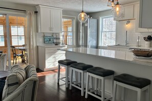 Fridge, microwave, oven, stovetop - Fully renovated, dog-friendly home with private beach access & golf nearby (Meredith)