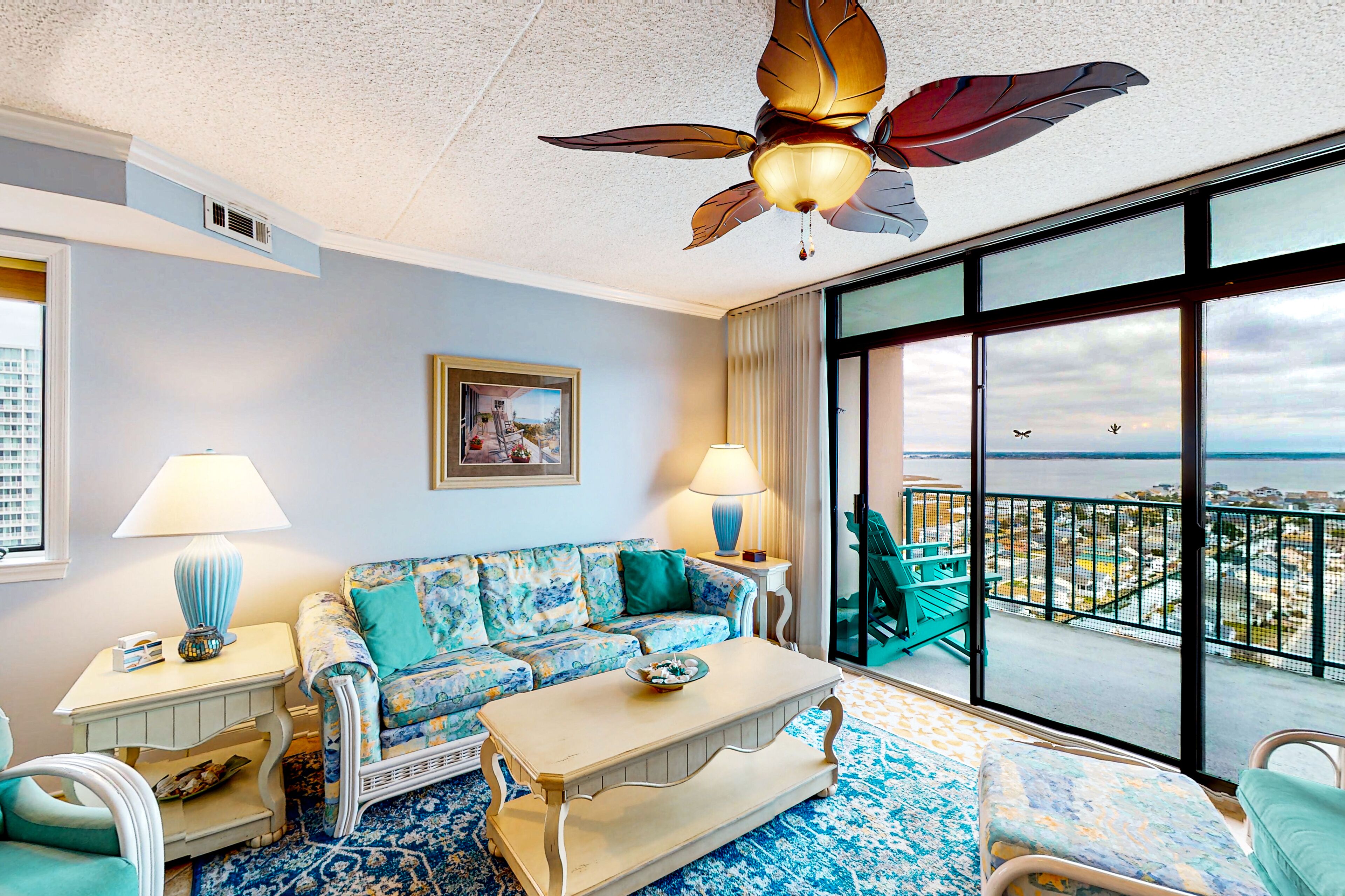 Water view condo with a balcony & AC - pool, sauna, and tennis court access