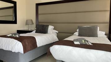 Standard Twin Room, Air conditioning | Individually furnished, desk, iron/ironing board, free WiFi