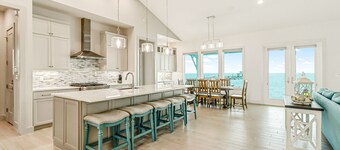 Bayfront water-view home with outdoor pool, lovely patio, hammock, fishing dock