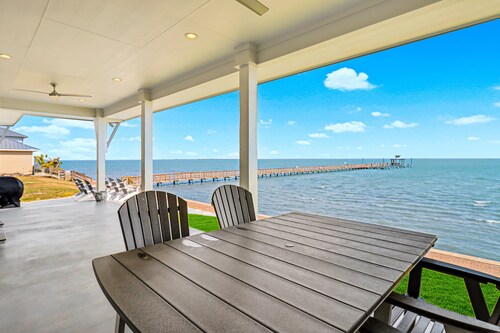 Bayfront water-view home with outdoor pool, lovely patio, hammock, fishing dock