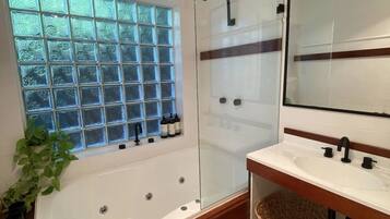 Jetted tub, hair dryer, towels, soap