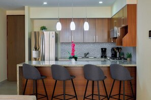 Fridge, microwave, oven, stovetop - Stylish New Luxury Condo in the Romantic Zone, Rooftop Pool, Walk to Beach (Puerto Vallarta)