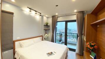 Apartemen Deluks | 3 kamar tidur, meja kerja, dan Wi-Fi gratis