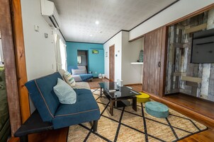 Villa | Living area | Flat-screen TV