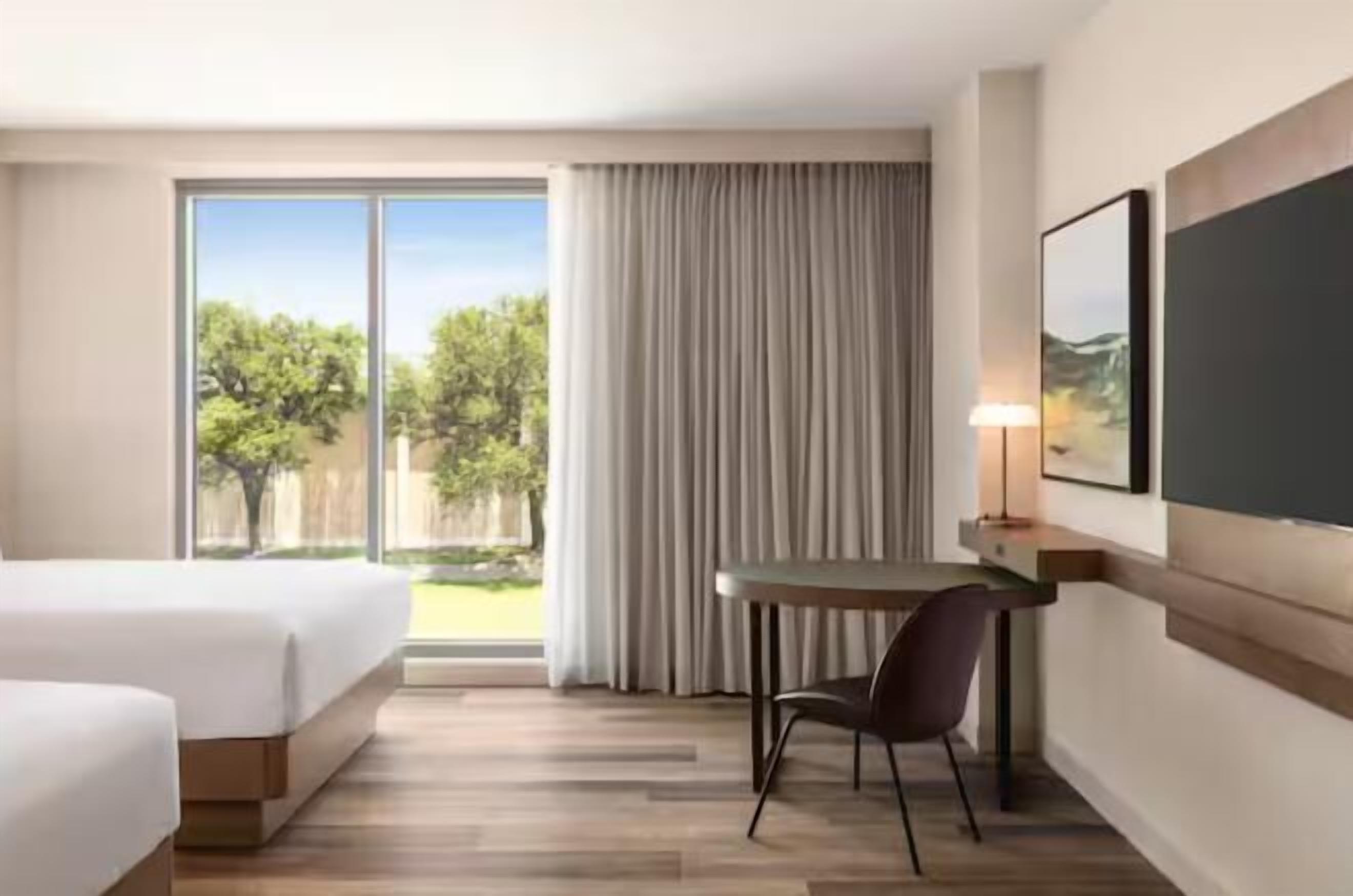 Desk, laptop workspace, free WiFi, bed sheets