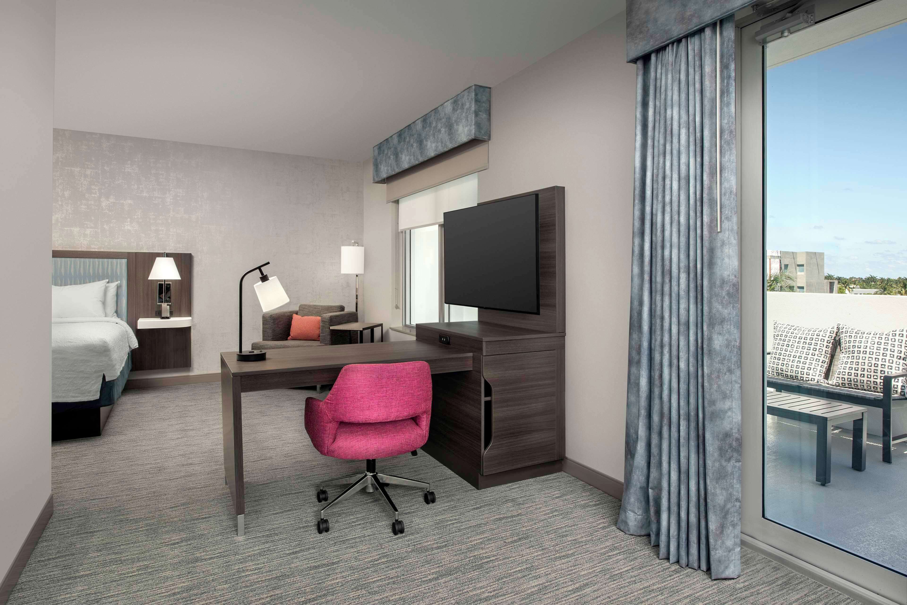 Studio Suite, 1 King Bed, Balcony | Desk, laptop workspace, blackout curtains, iron/ironing board