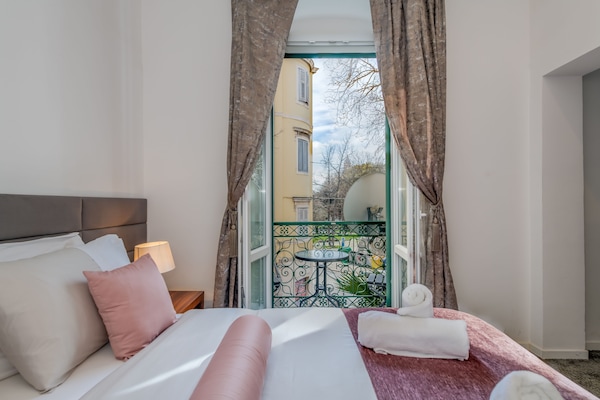 Deluxe Suite with Balcony | Egyptian cotton sheets, premium bedding, minibar, in-room safe