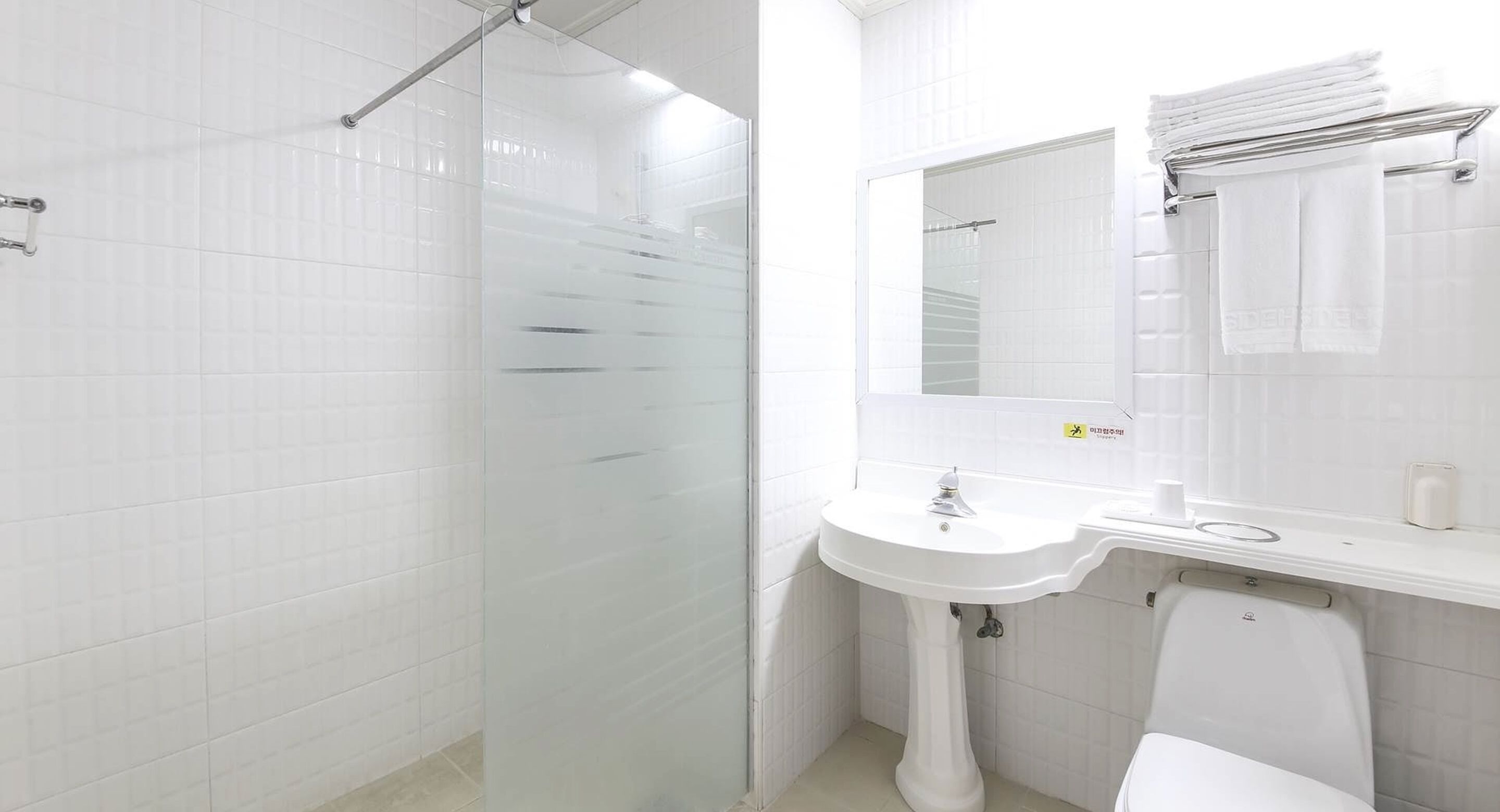 premium twin room | bathroom | hair dryer, towels