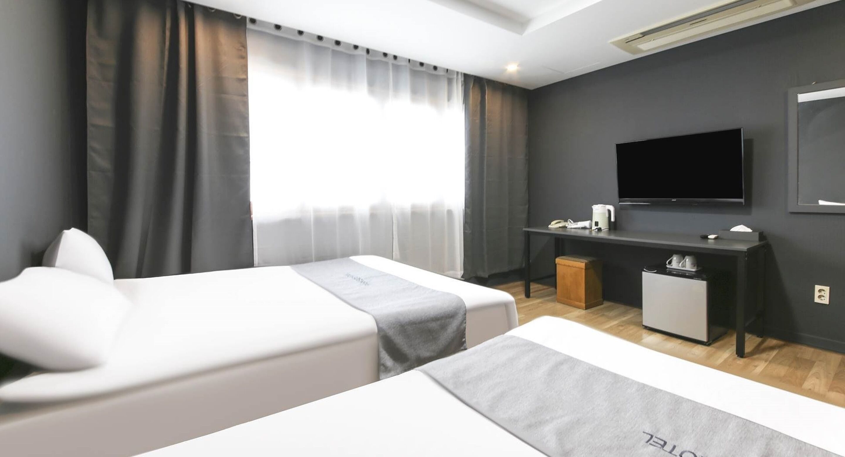 premium twin room | premium bedding, down duvets, select comfort beds, desk