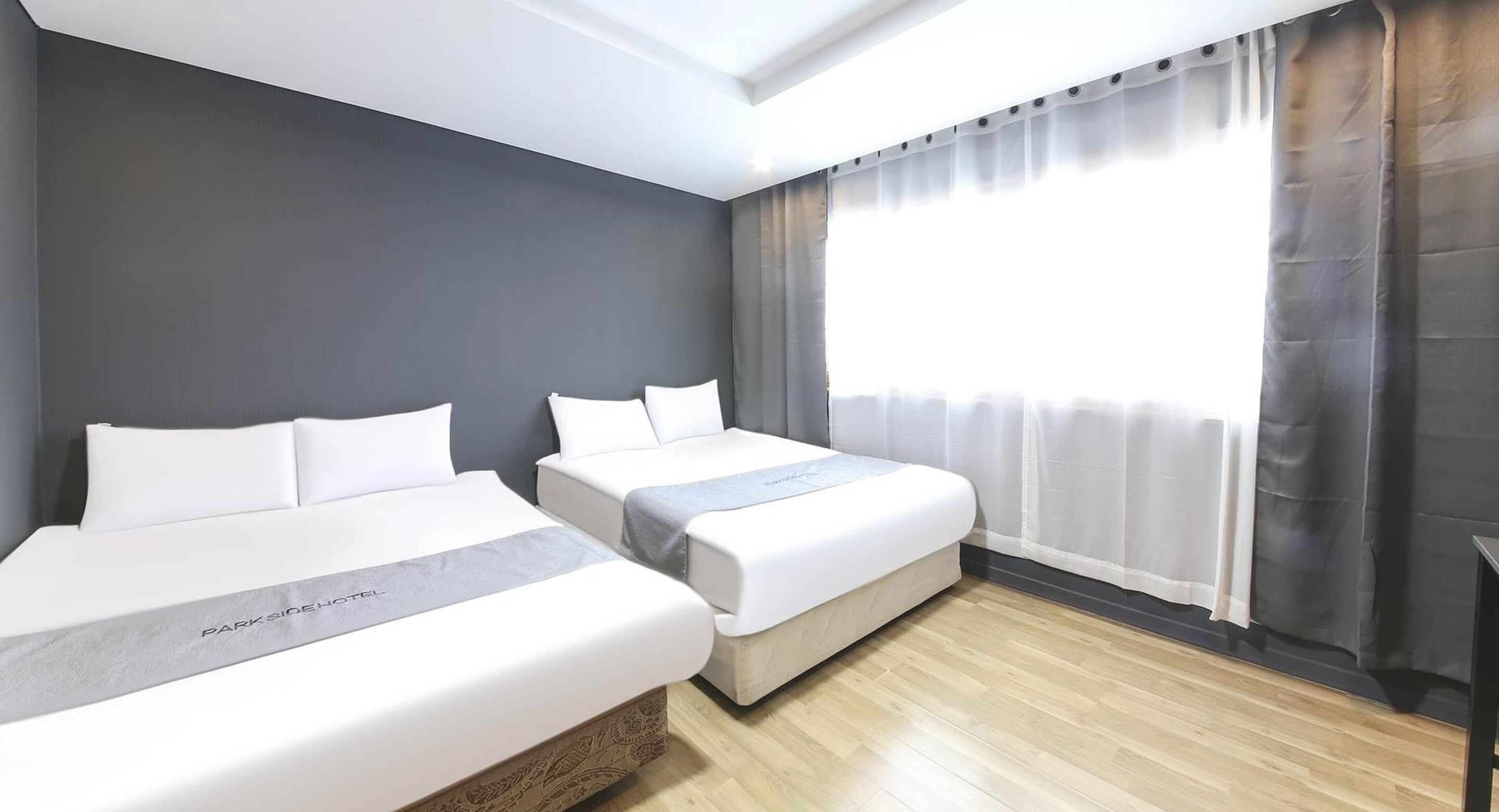 premium twin room | premium bedding, down duvets, select comfort beds, desk