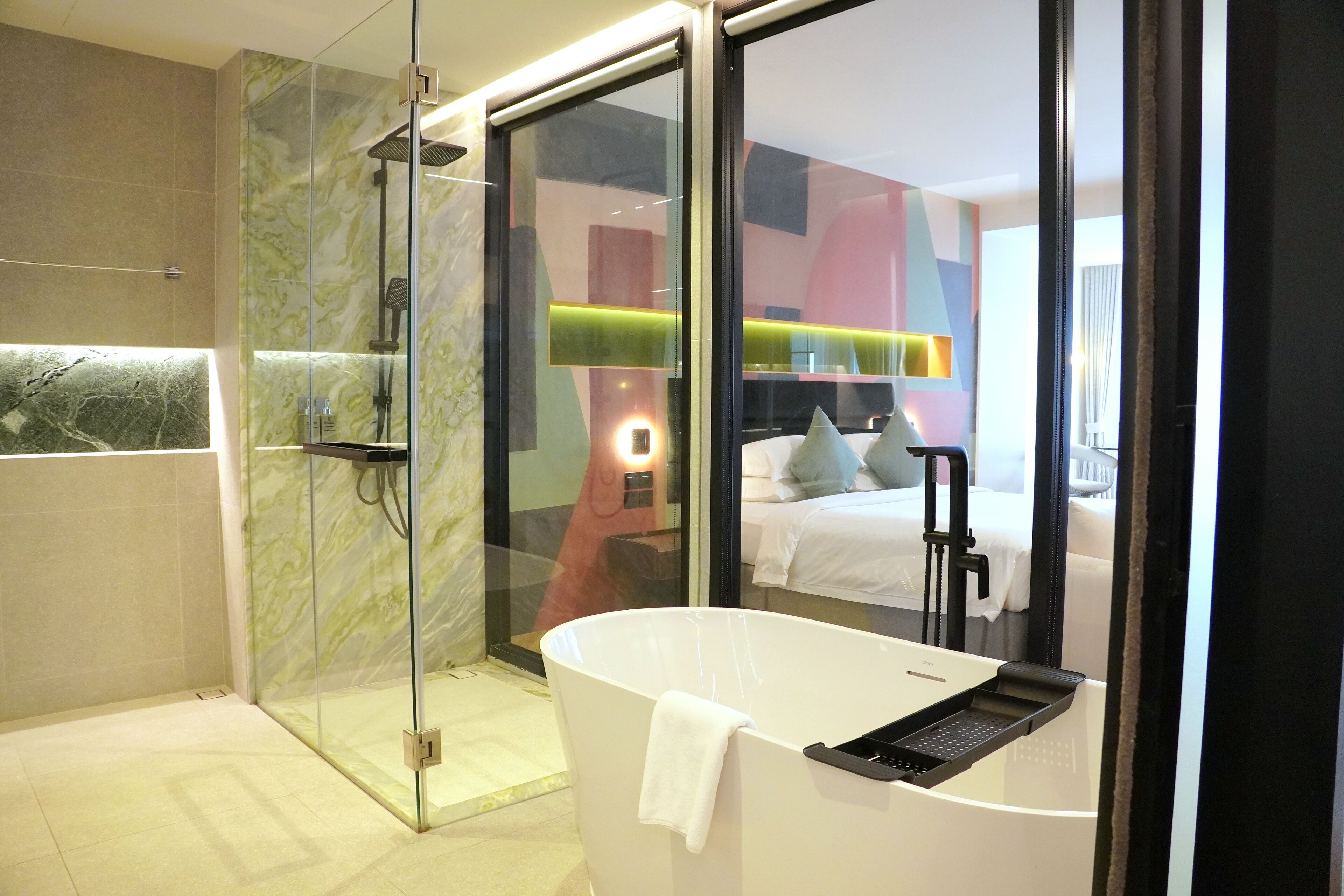 Deluxe Premier | Bathroom | Shower, hair dryer, slippers, towels