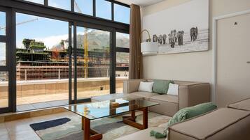 City Apartment | Living area | 40-inch flat-screen TV with cable channels, TV, Netflix