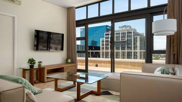 City Apartment | Living area | 40-inch flat-screen TV with cable channels, TV, Netflix