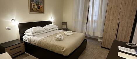 Family Room | Down comforters, memory foam beds, free WiFi, bed sheets