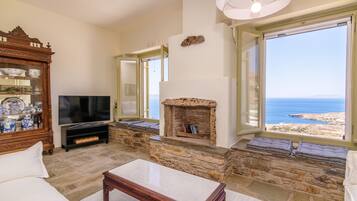 Deluxe Villa | Living area | Flat-screen TV