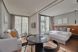 Standard Suite | Living area | 43-inch Smart TV with satellite channels, TV, offices