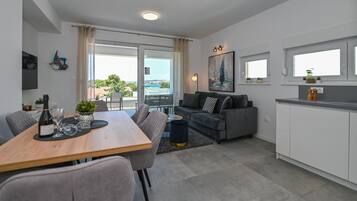 Comfort Apartment, 2 Bedrooms, Terrace | Living area | 32-inch flat-screen TV with satellite channels, TV