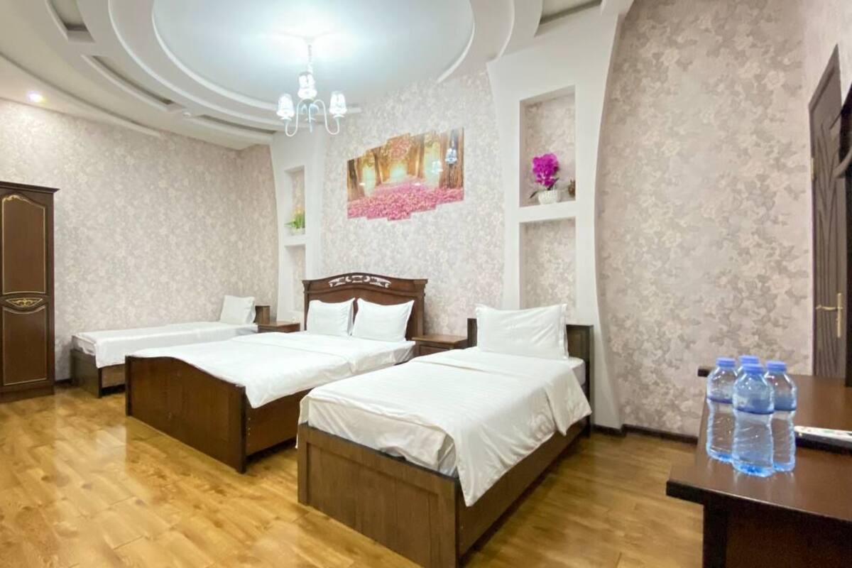 Habitación triple estándar | Cortinas blackout, tabla de planchar con plancha y wifi gratis
