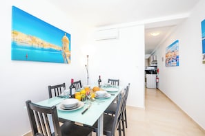 Standard Apartment, 2 Bedrooms, Sea View | Living area | 43-inch LCD TV with satellite channels, TV - Islet Seafront Family Apartment  (St. Paul's Bay)