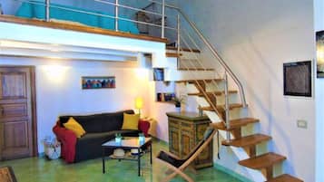 Apartamento panorâmico | Área de estar | TV de tela plana